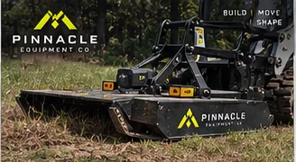 Pinnacle brush hog attachment in a wooded setting
